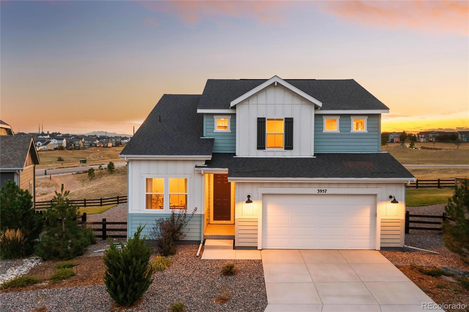 3957 Breakcamp Court Castle Rock, CO 80108 - Photo 2 of 50 a front view of a house with a yard
