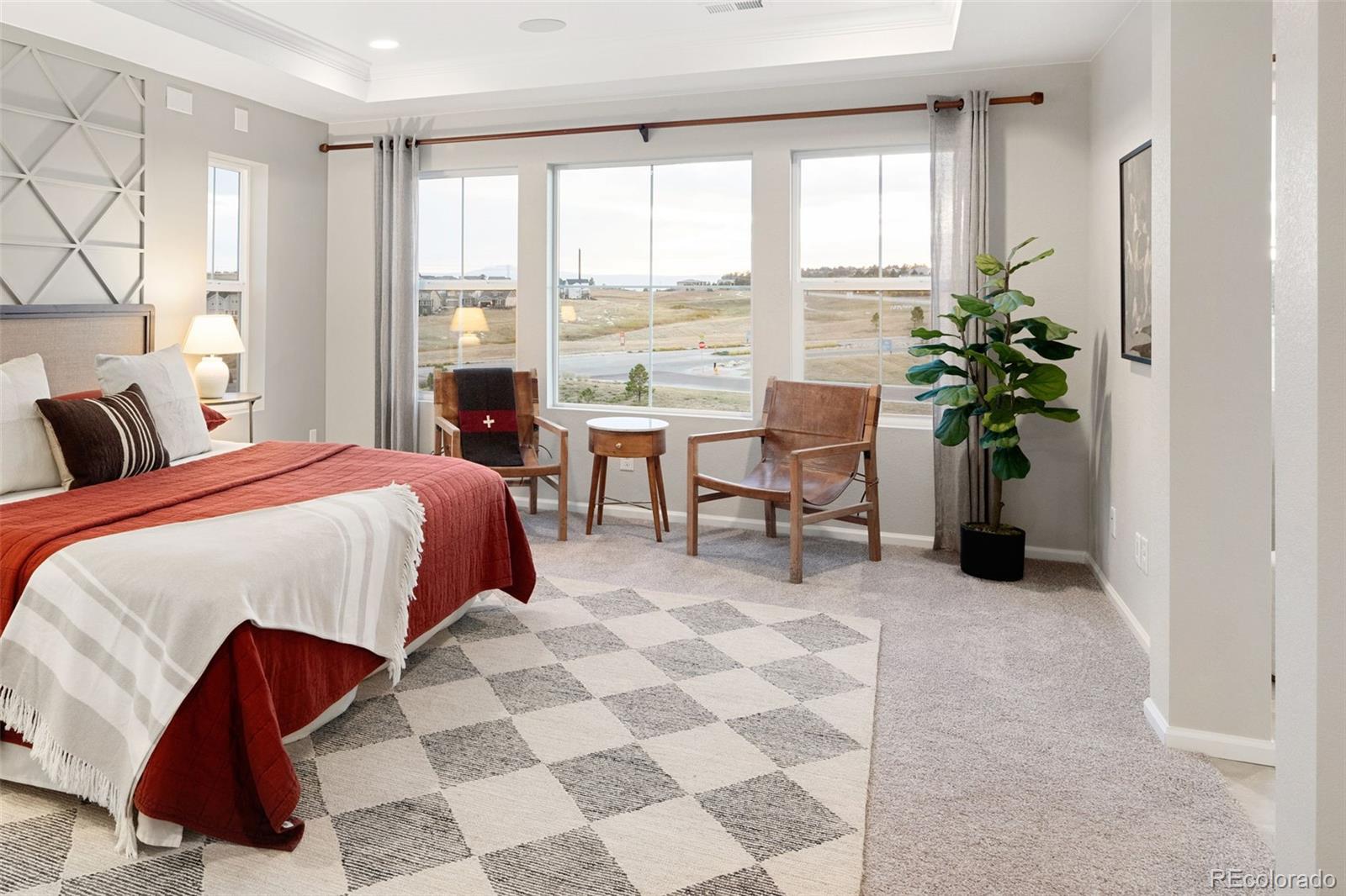 3957 Breakcamp Court Castle Rock, CO 80108 - Photo 33 of 50 a bed room with a bed and a chair