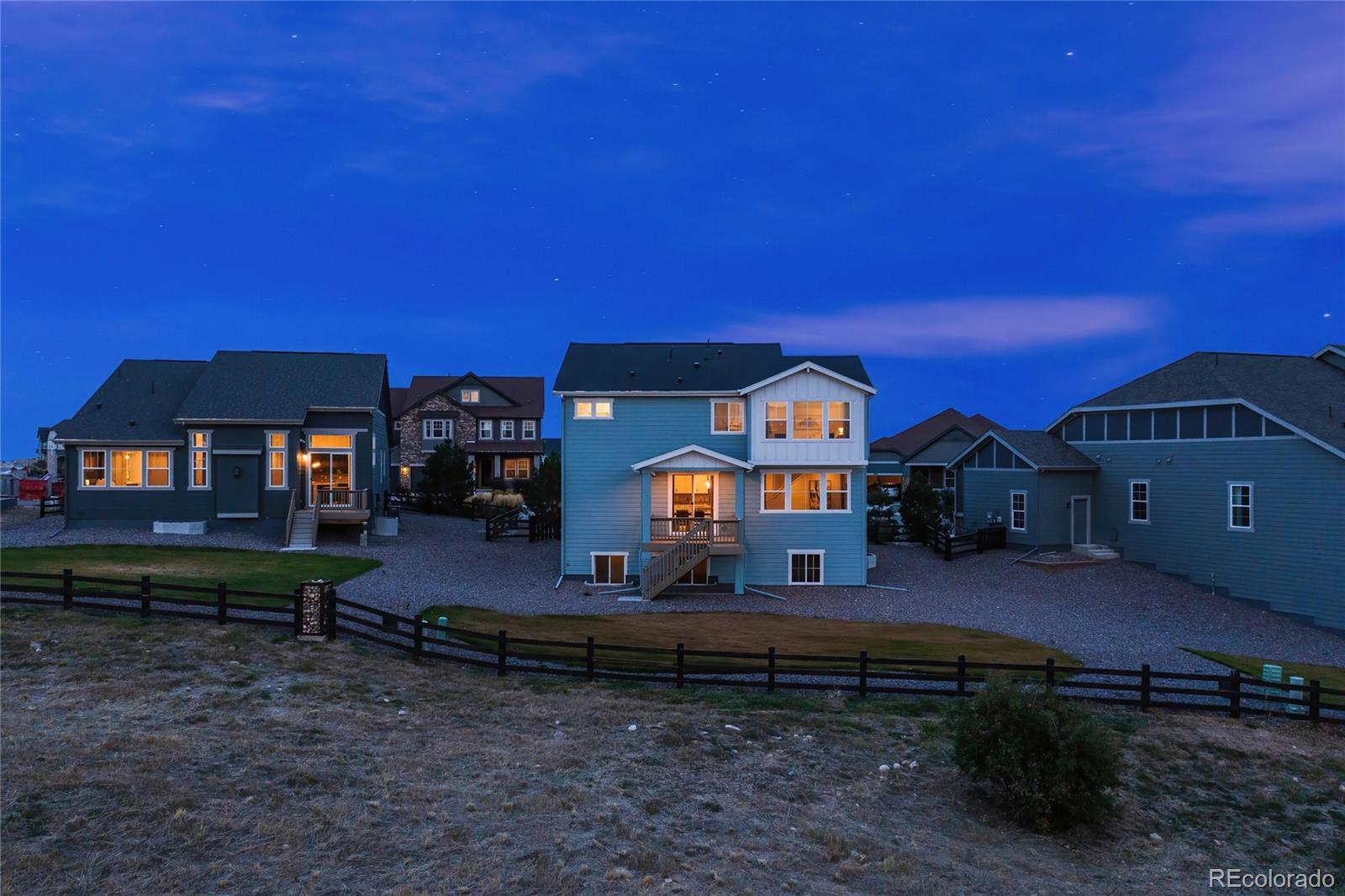 3957 Breakcamp Court Castle Rock, CO 80108 - Photo 45 of 50 a front view of a house with a yard