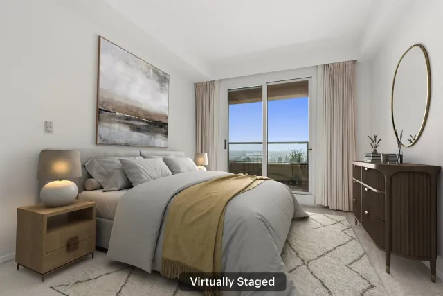 an outdoor space with patio and white umbrellas