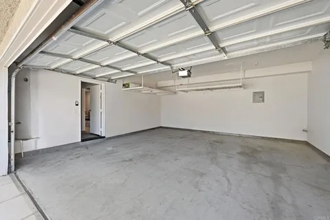 a view of road with palm trees