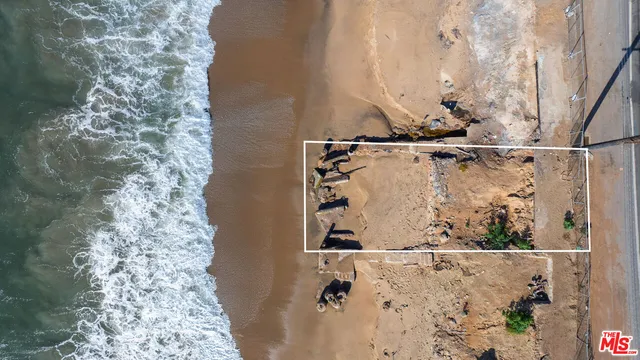 a view of swimming pool with a yard
