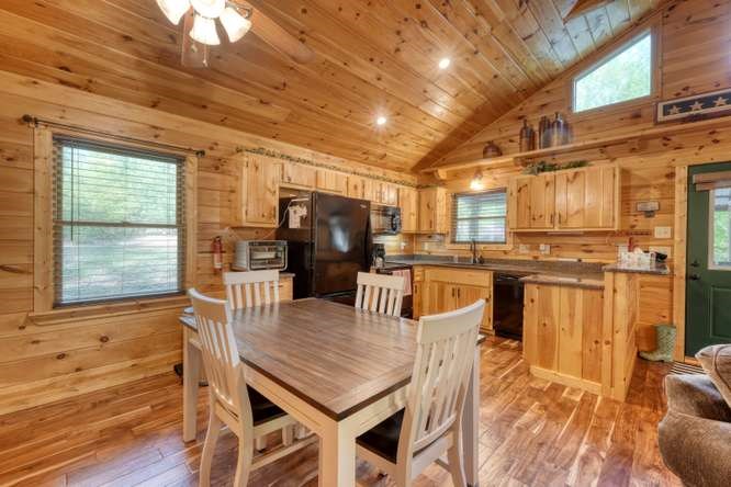 130 Coopers Ridge Road Murphy, NC 28906 - Photo 13 of 32 a view of a dining room with furniture and wooden floor