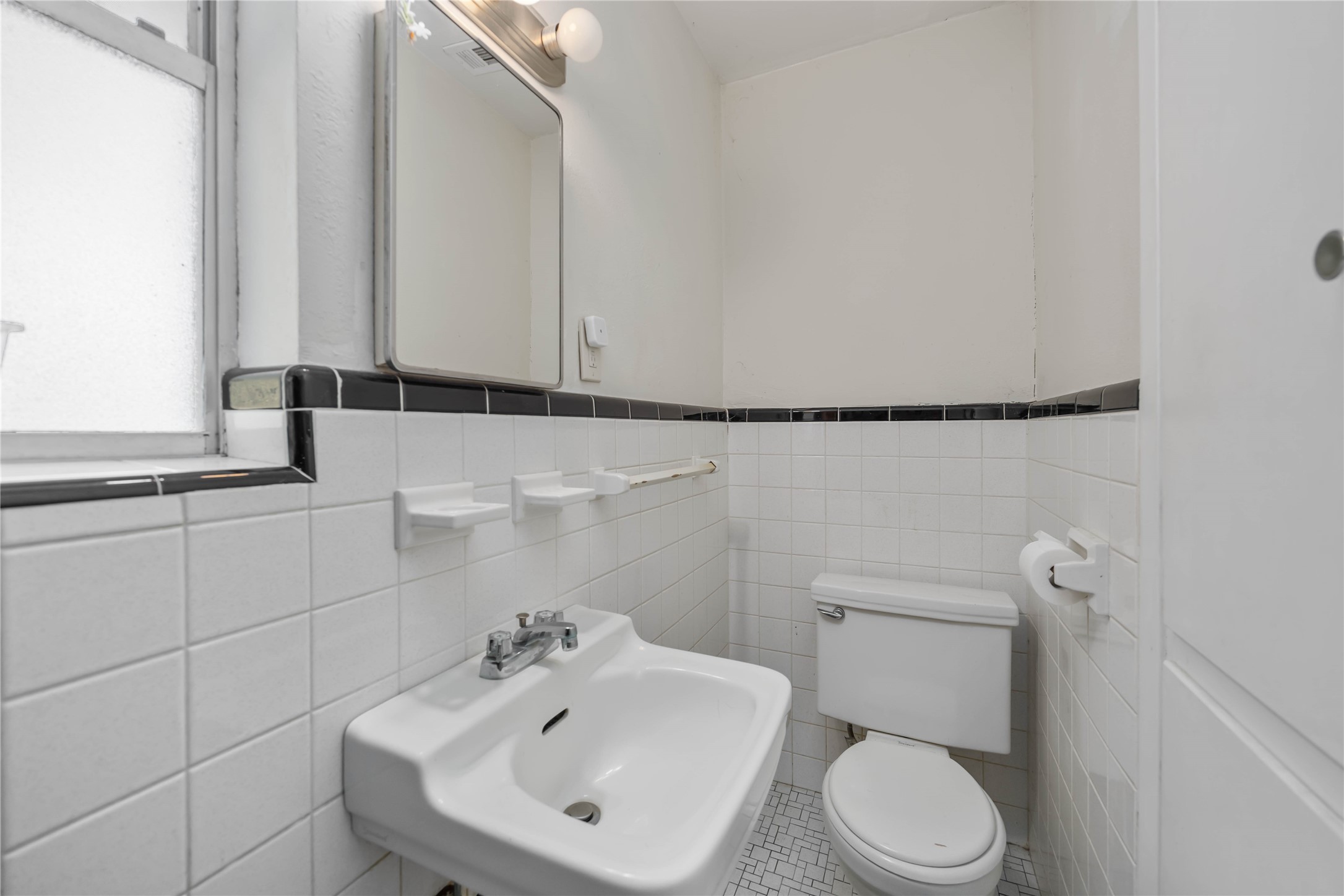 615 Massey Tompkins Road Baytown, TX 77521 - Photo 13 of 25 a bathroom with a sink toilet and mirror
