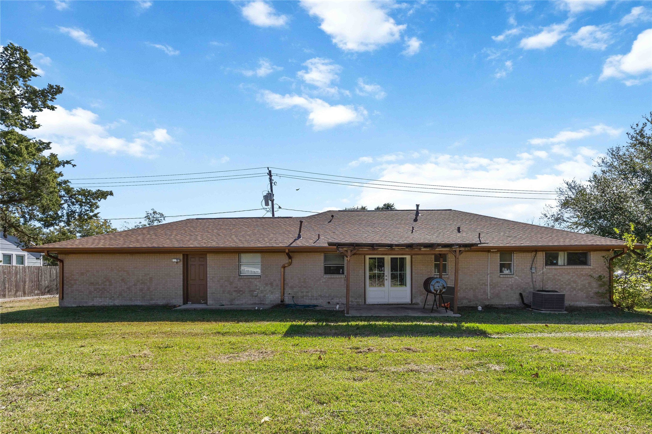 615 Massey Tompkins Road Baytown, TX 77521 - Photo 22 of 25 a front view of a house with swimming pool having outdoor seating
