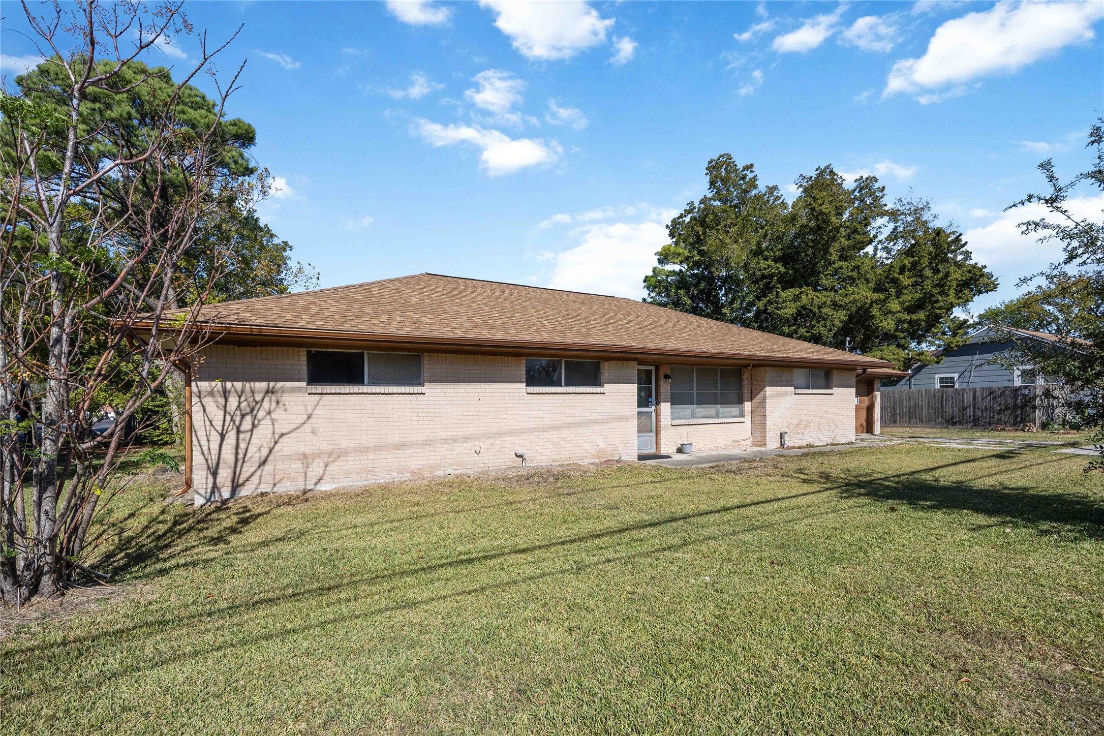615 Massey Tompkins Road Baytown, TX 77521 - Photo 24 of 25 a front view of a house with a yard