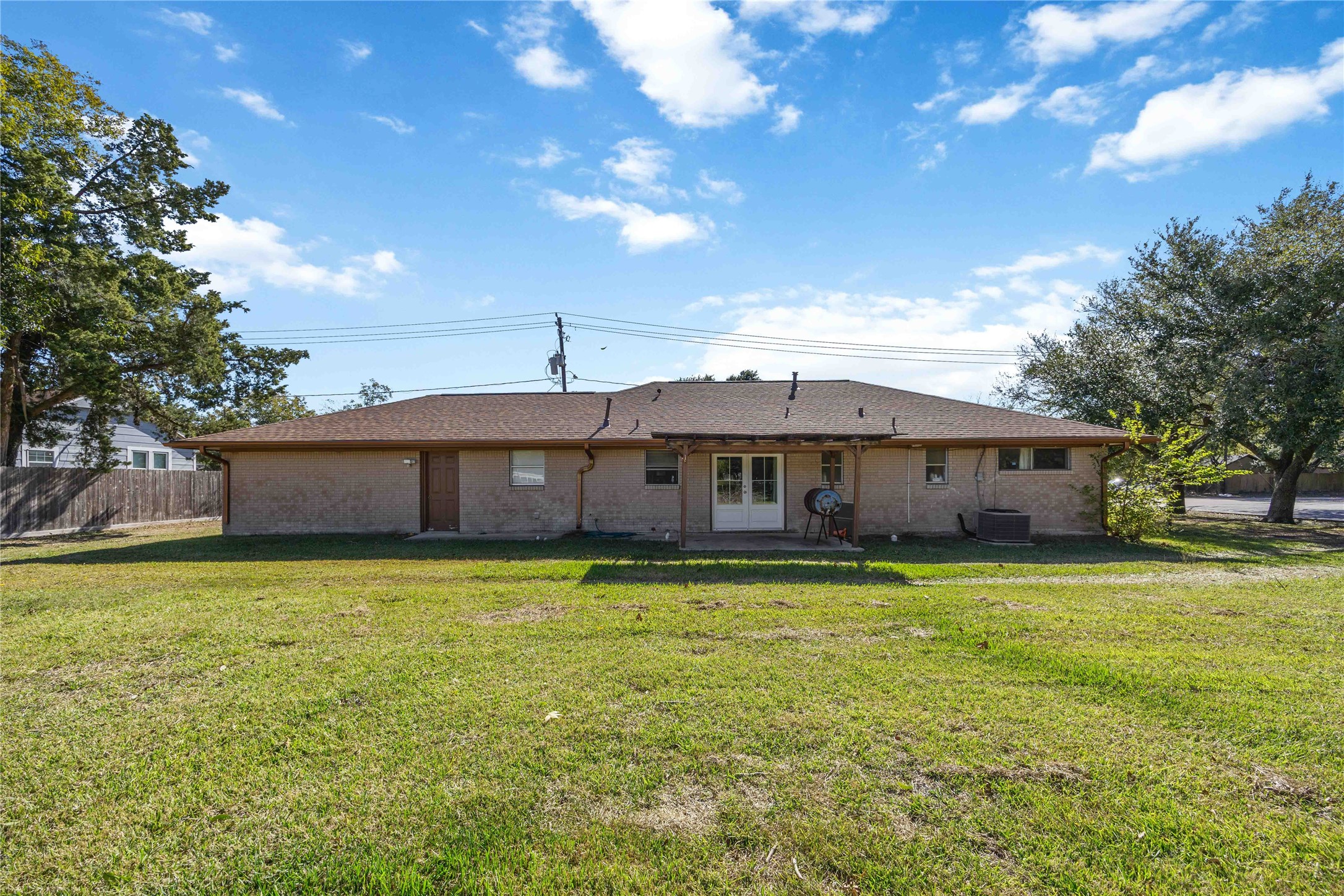 615 Massey Tompkins Road Baytown, TX 77521 - Photo 25 of 25 a view of a house with a big yard