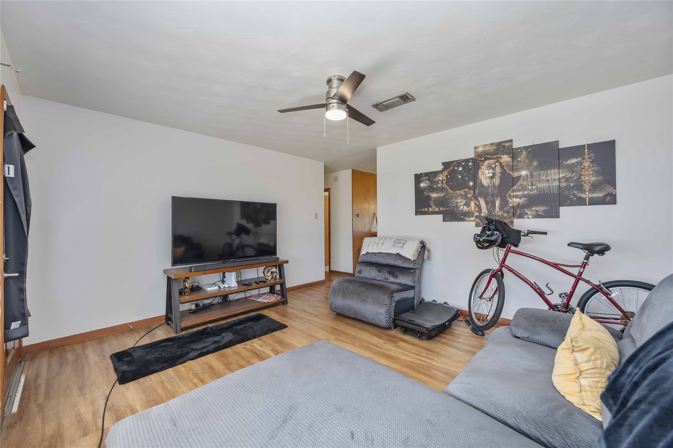 615 Massey Tompkins Road Baytown, TX 77521 - Photo 5 of 25 a living room with furniture and a flat screen tv