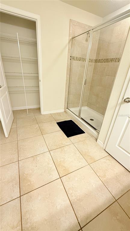 7580 Aloma Pines Court Winter Park, FL 32792 - Photo 21 of 36 a bathroom with a shower
