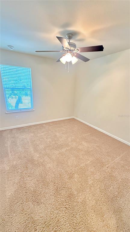 7580 Aloma Pines Court Winter Park, FL 32792 - Photo 22 of 36 a view of a small space with a ceiling fan and a window