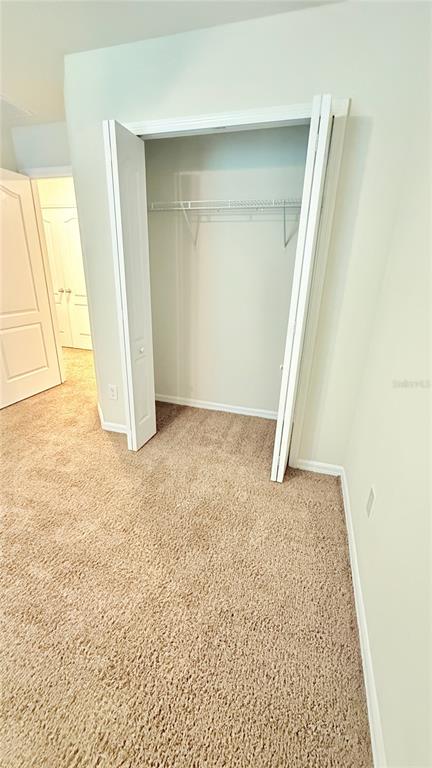 7580 Aloma Pines Court Winter Park, FL 32792 - Photo 24 of 36 an empty room with windows