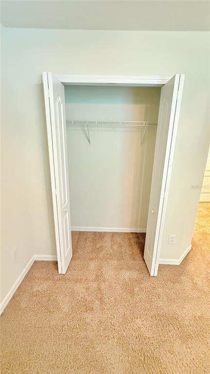 7580 Aloma Pines Court Winter Park, FL 32792 - Photo 25 of 36 an empty room with a window