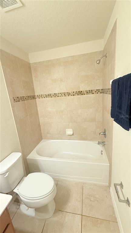 7580 Aloma Pines Court Winter Park, FL 32792 - Photo 27 of 36 a bathroom with a toilet and a bath tub