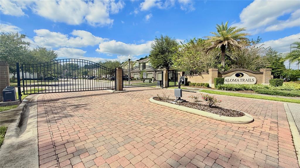 7580 Aloma Pines Court Winter Park, FL 32792 - Photo 35 of 36 a view of a swimming pool with a yard