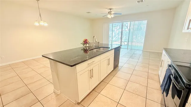 a bathroom with a sink a vanity and a mirror