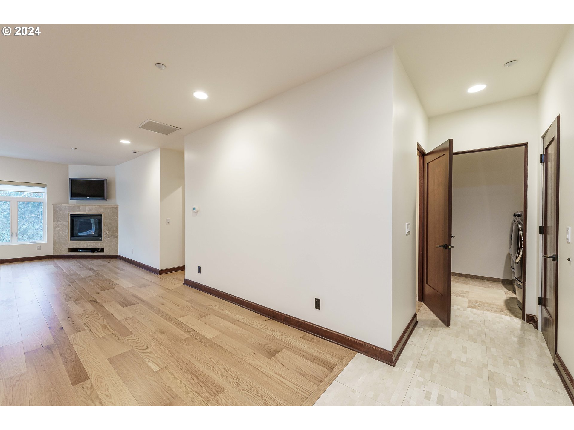3030 Northwest Montara Loop Portland, OR 97229 - Photo 15 of 37 a view of empty room with wooden floor
