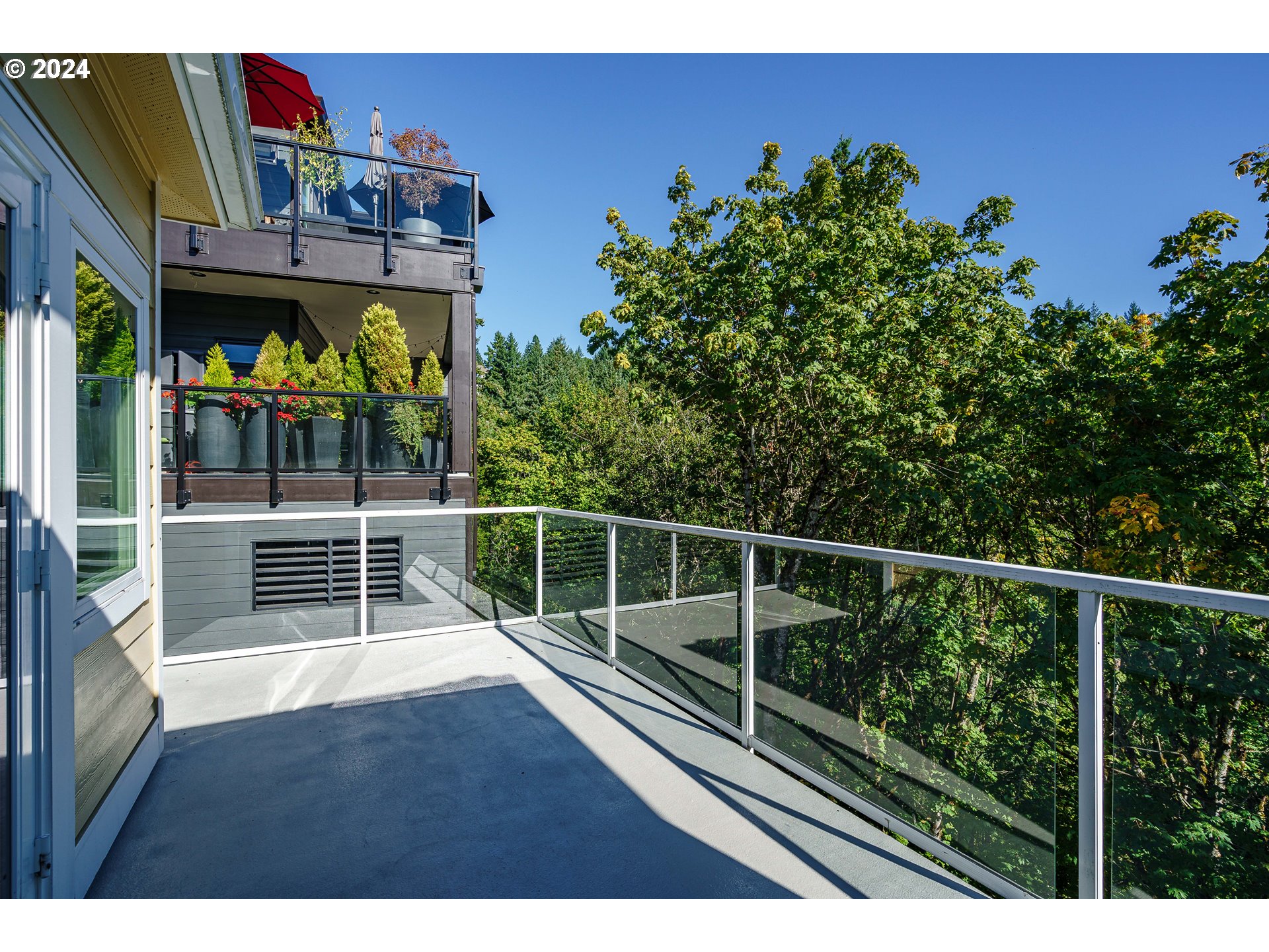 3030 Northwest Montara Loop Portland, OR 97229 - Photo 3 of 37 a view of a balcony with outdoor space
