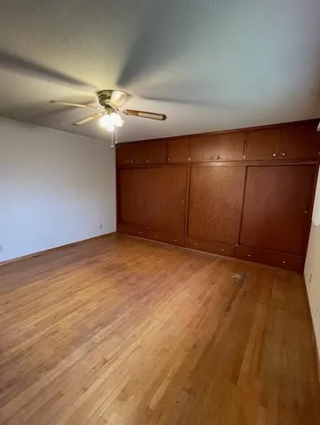 a view of a room with wooden ceiling