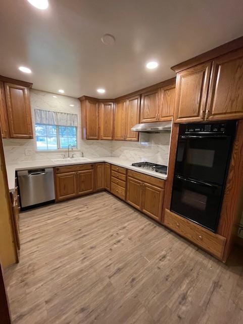 119 East Clausen Road Turlock, CA 95380 - Photo 4 of 26 a kitchen with stainless steel appliances granite countertop a stove a sink and a microwave
