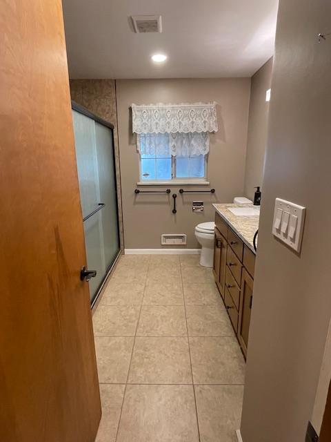 119 East Clausen Road Turlock, CA 95380 - Photo 9 of 26 a room with stainless steel appliances a sink a counter top space and cabinets