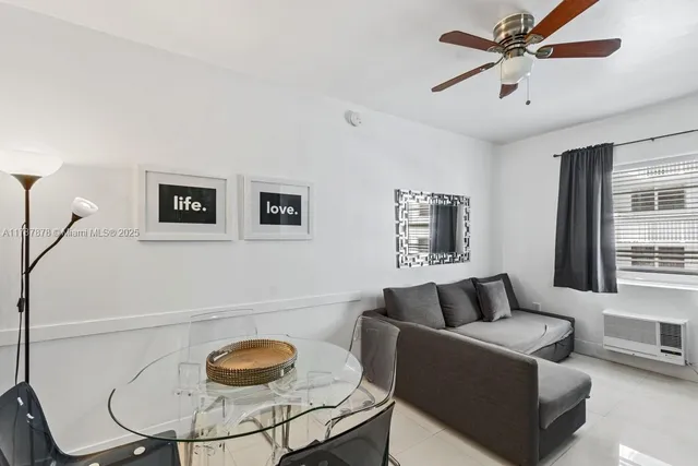 a living room with furniture and a window