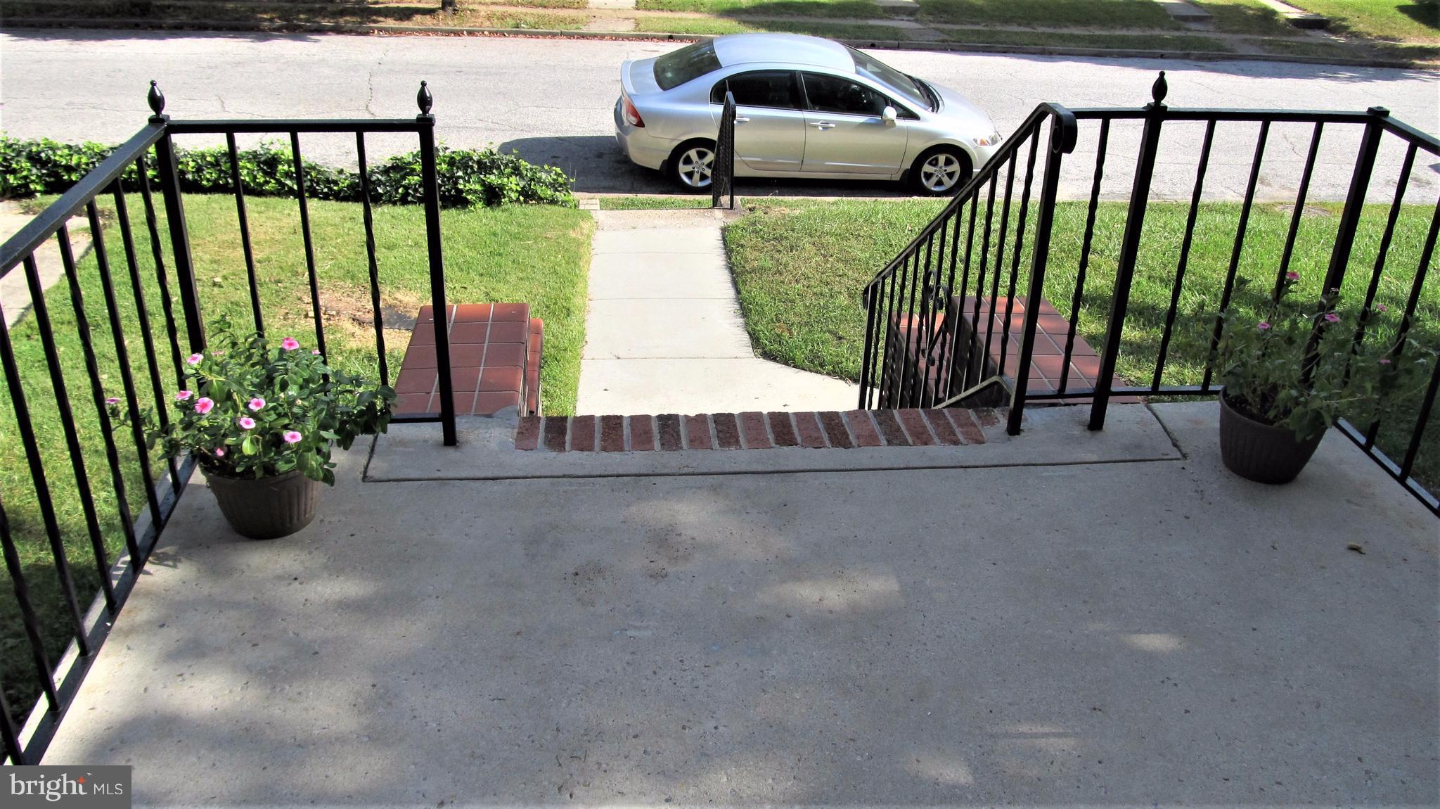 926 Elm Ridge Avenue Baltimore, MD 21229 - Photo 16 of 21 Roomy front porch!