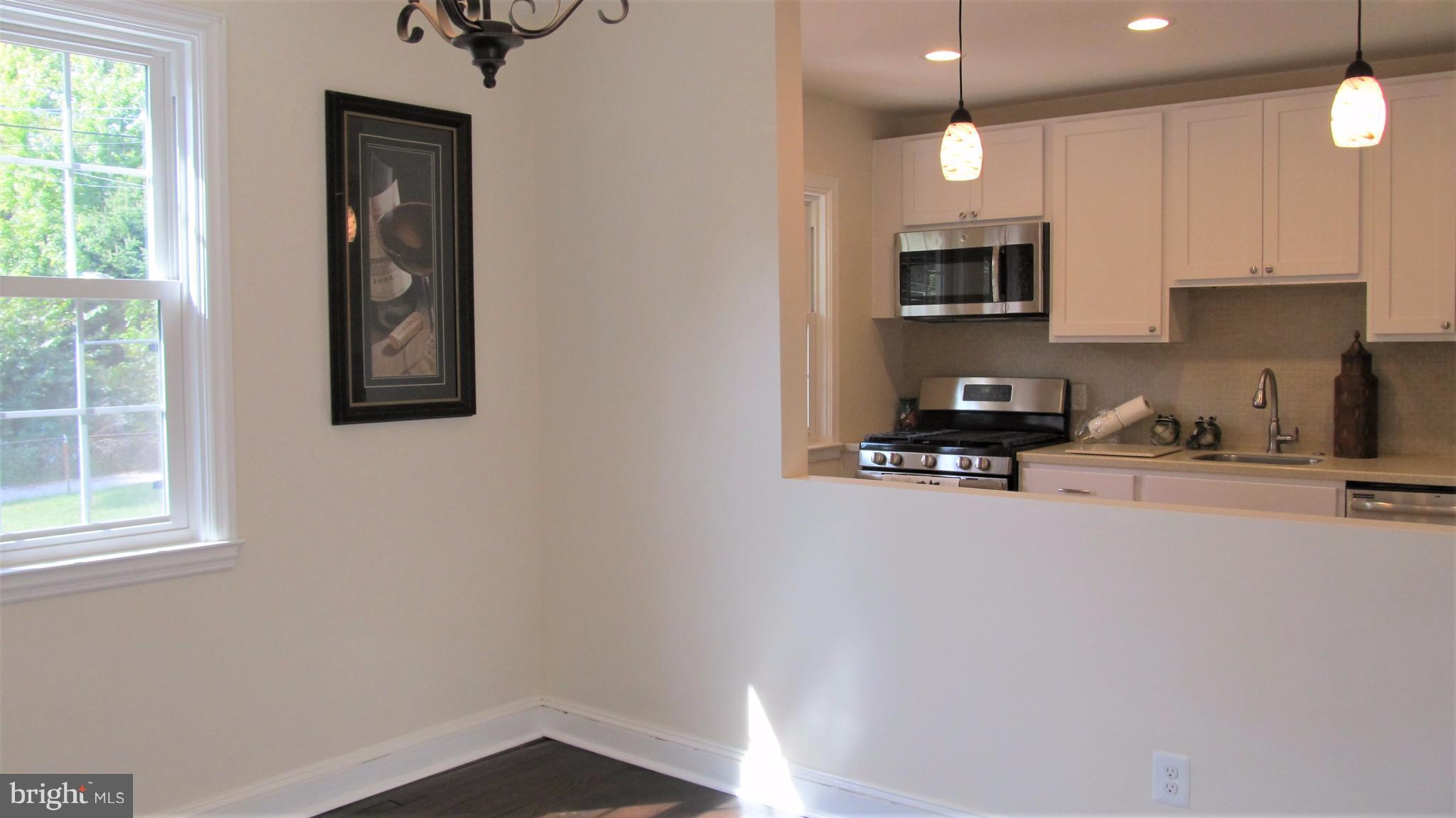 926 Elm Ridge Avenue Baltimore, MD 21229 - Photo 7 of 21 Pass through to kitchen!Dining Room