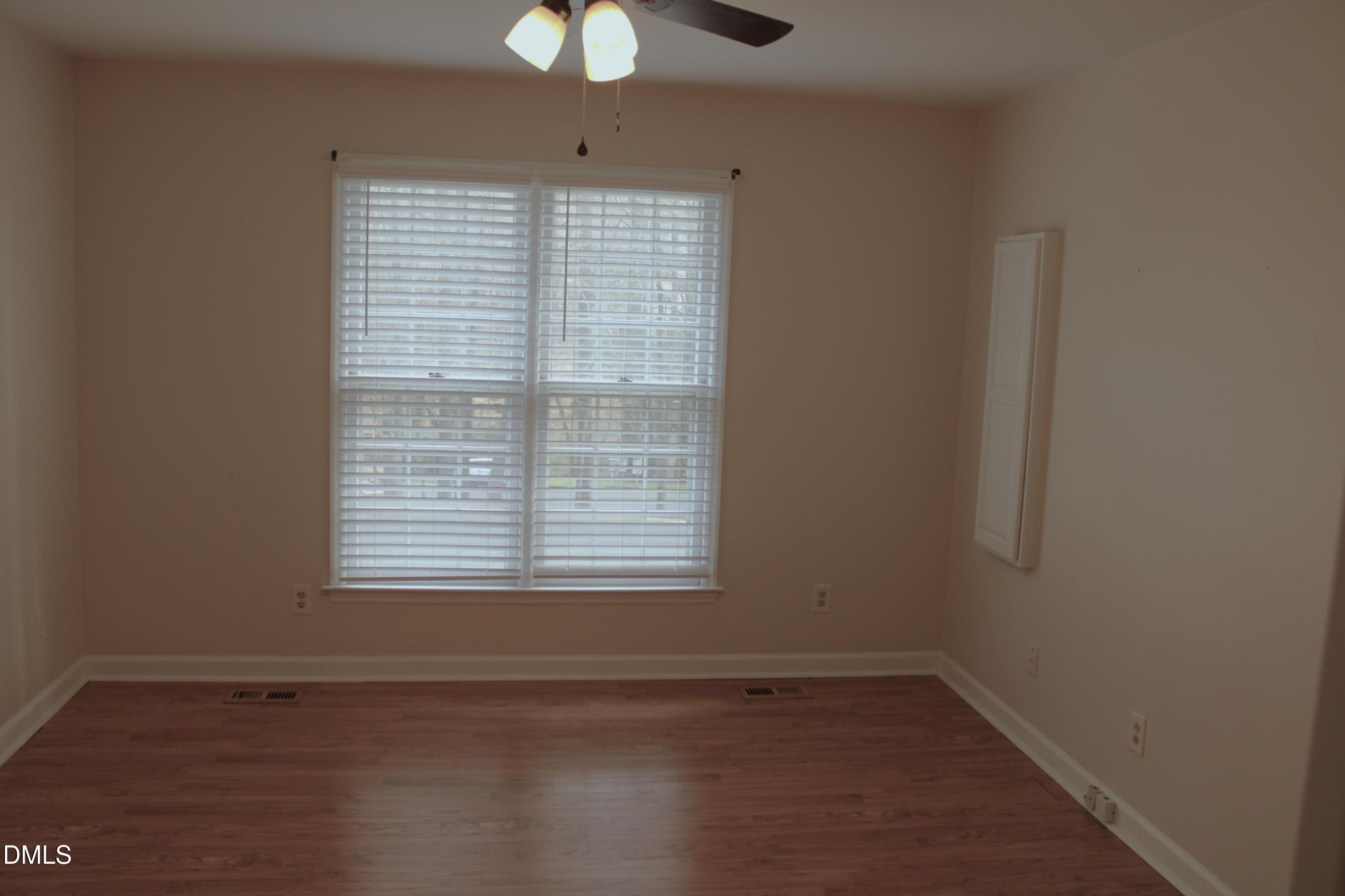 6701 Queen Annes Drive Raleigh, NC 27613 - Photo 14 of 23 an empty room with a window