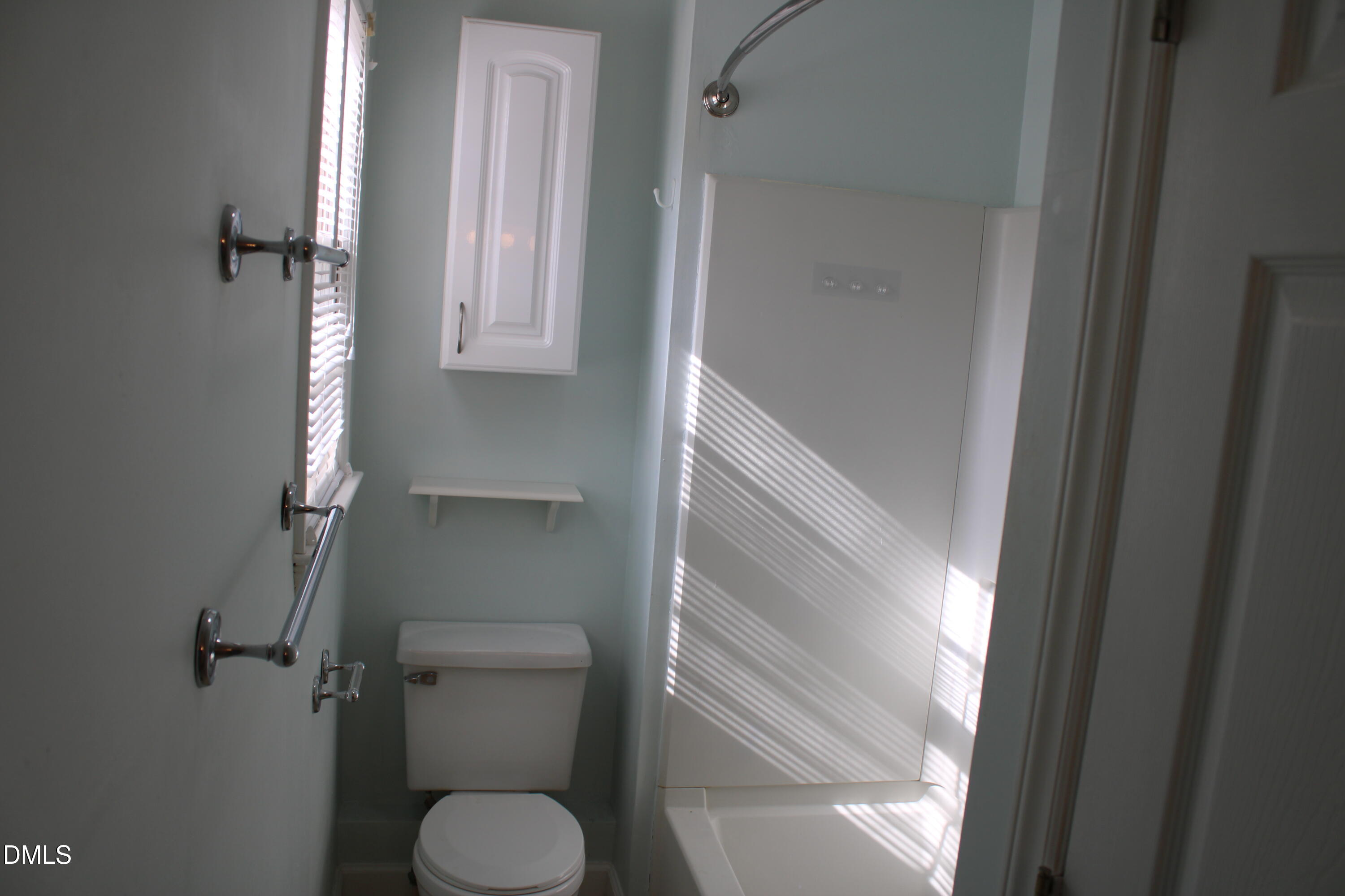 6701 Queen Annes Drive Raleigh, NC 27613 - Photo 16 of 23 a bathroom with a toilet