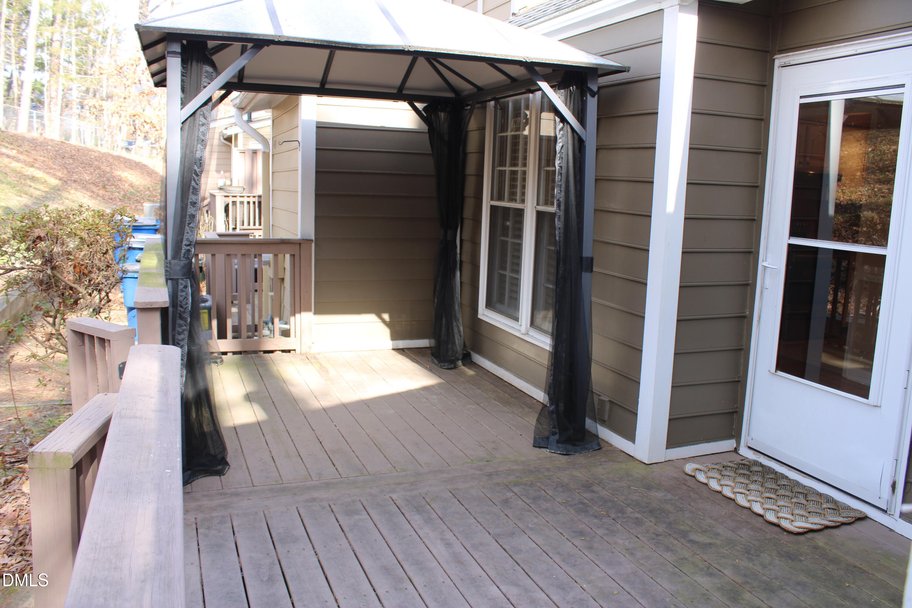 6701 Queen Annes Drive Raleigh, NC 27613 - Photo 20 of 23 a view of balcony with furniture