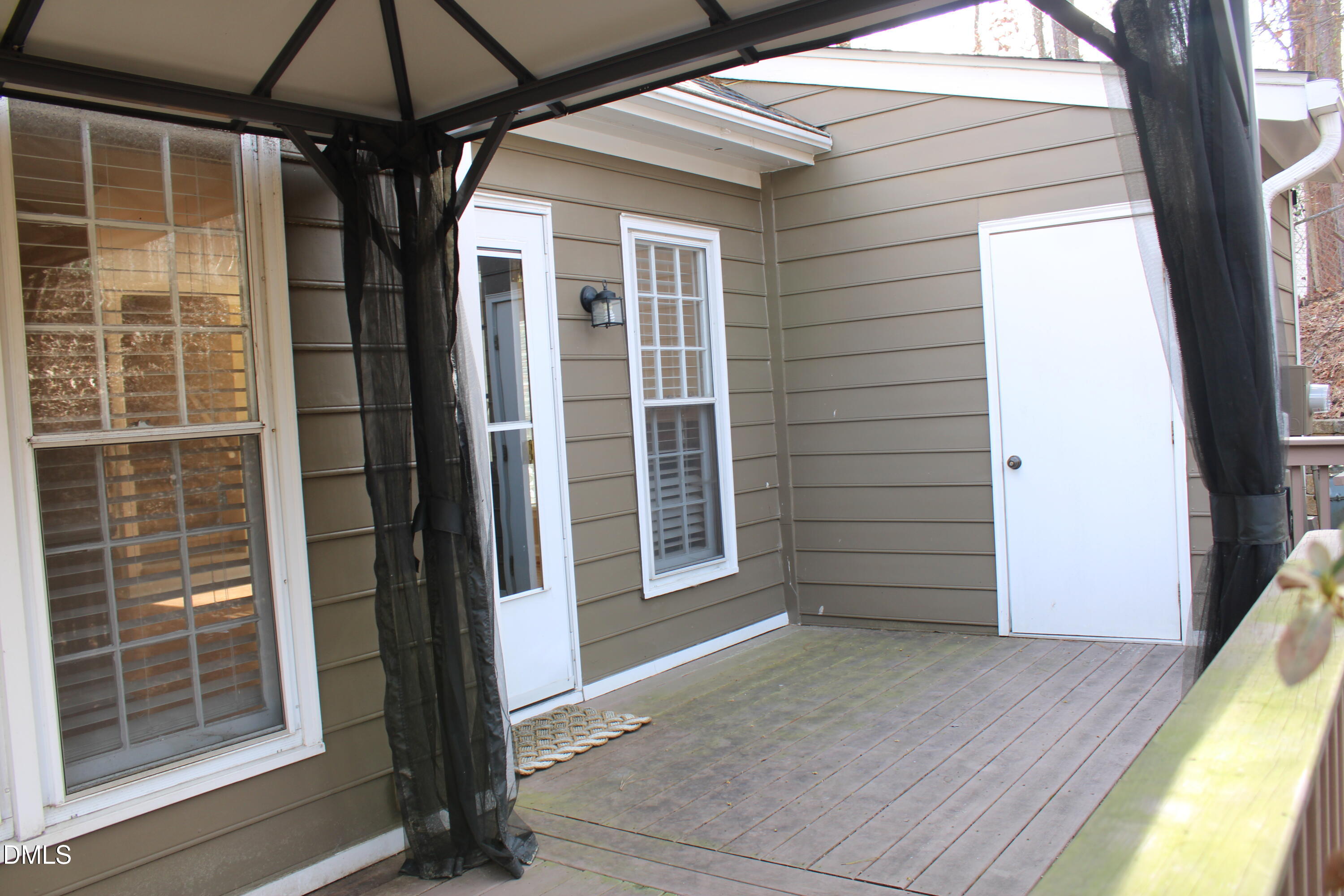 6701 Queen Annes Drive Raleigh, NC 27613 - Photo 21 of 23 a view of front door and porch