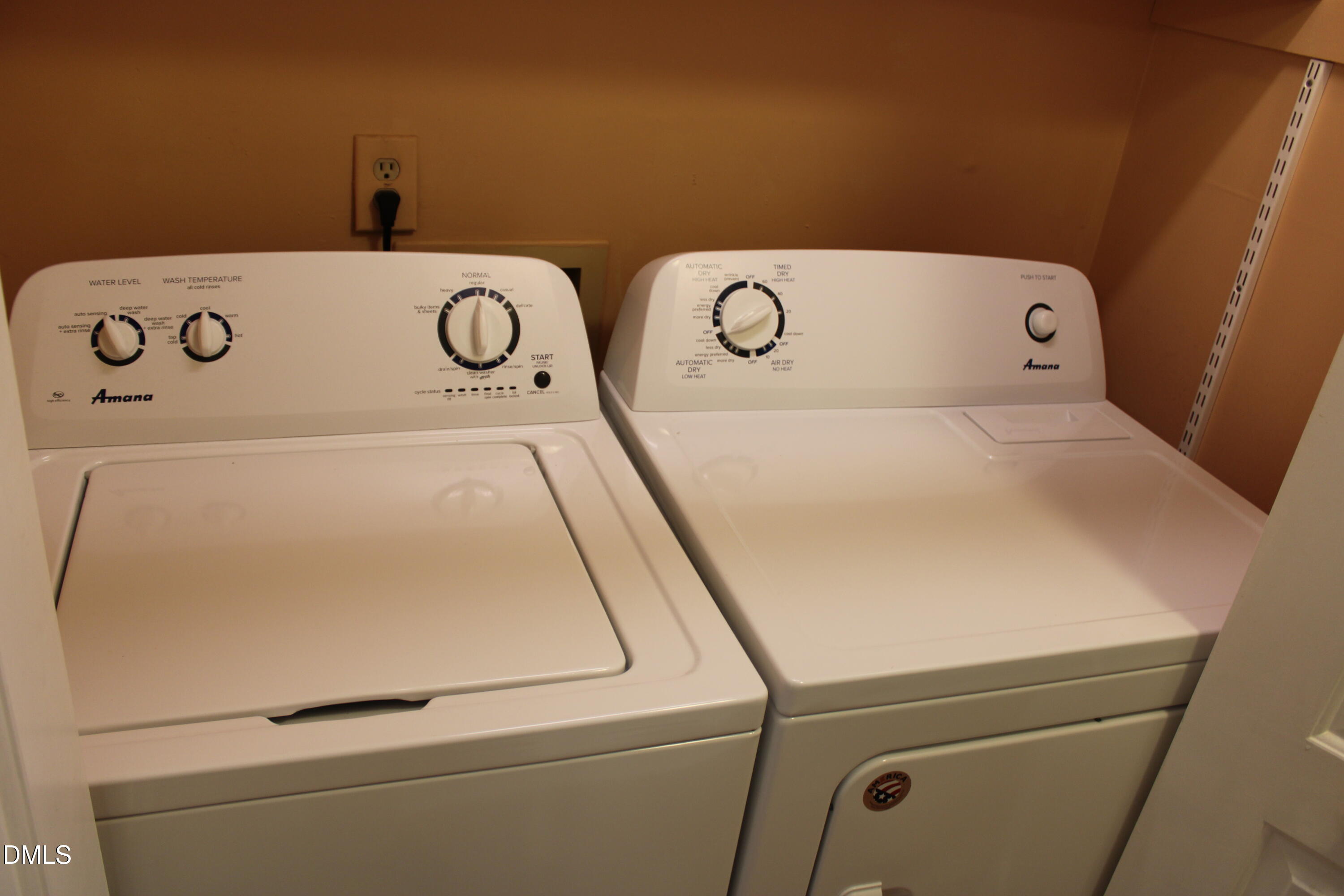 6701 Queen Annes Drive Raleigh, NC 27613 - Photo 9 of 23 a utility room with dryer and washer