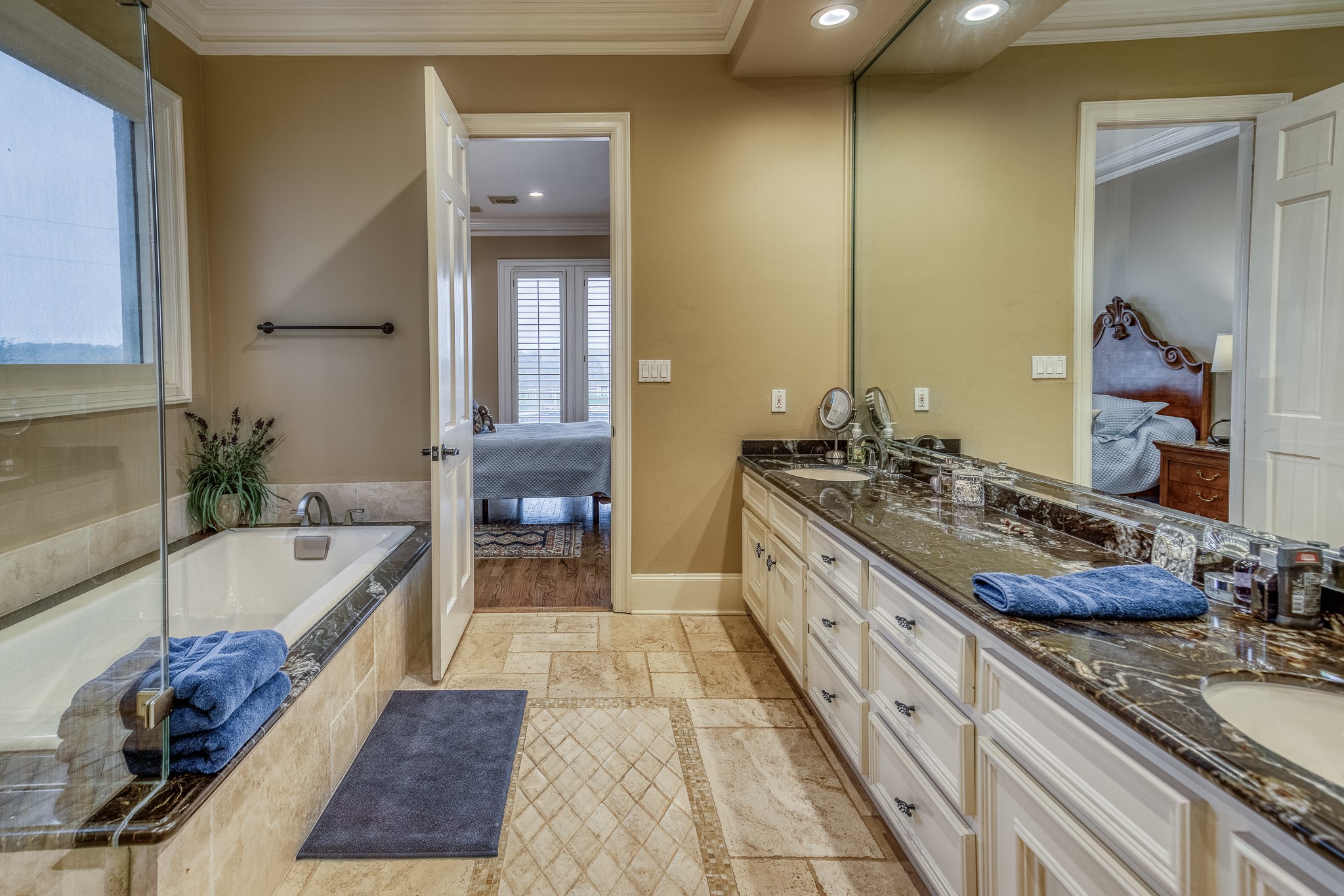 2204 Carter Road Bellville, TX 77418 - Photo 17 of 30 a large bathroom with a tub and sink