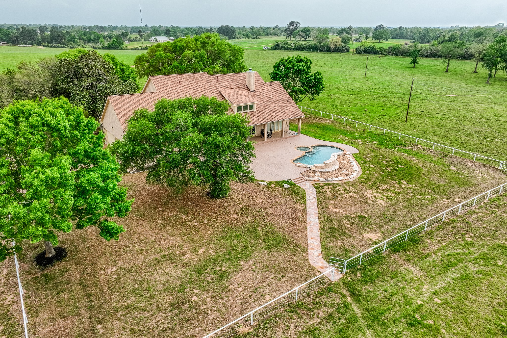 2204 Carter Road Bellville, TX 77418 - Photo 4 of 30 a view of a garden with an ocean beach