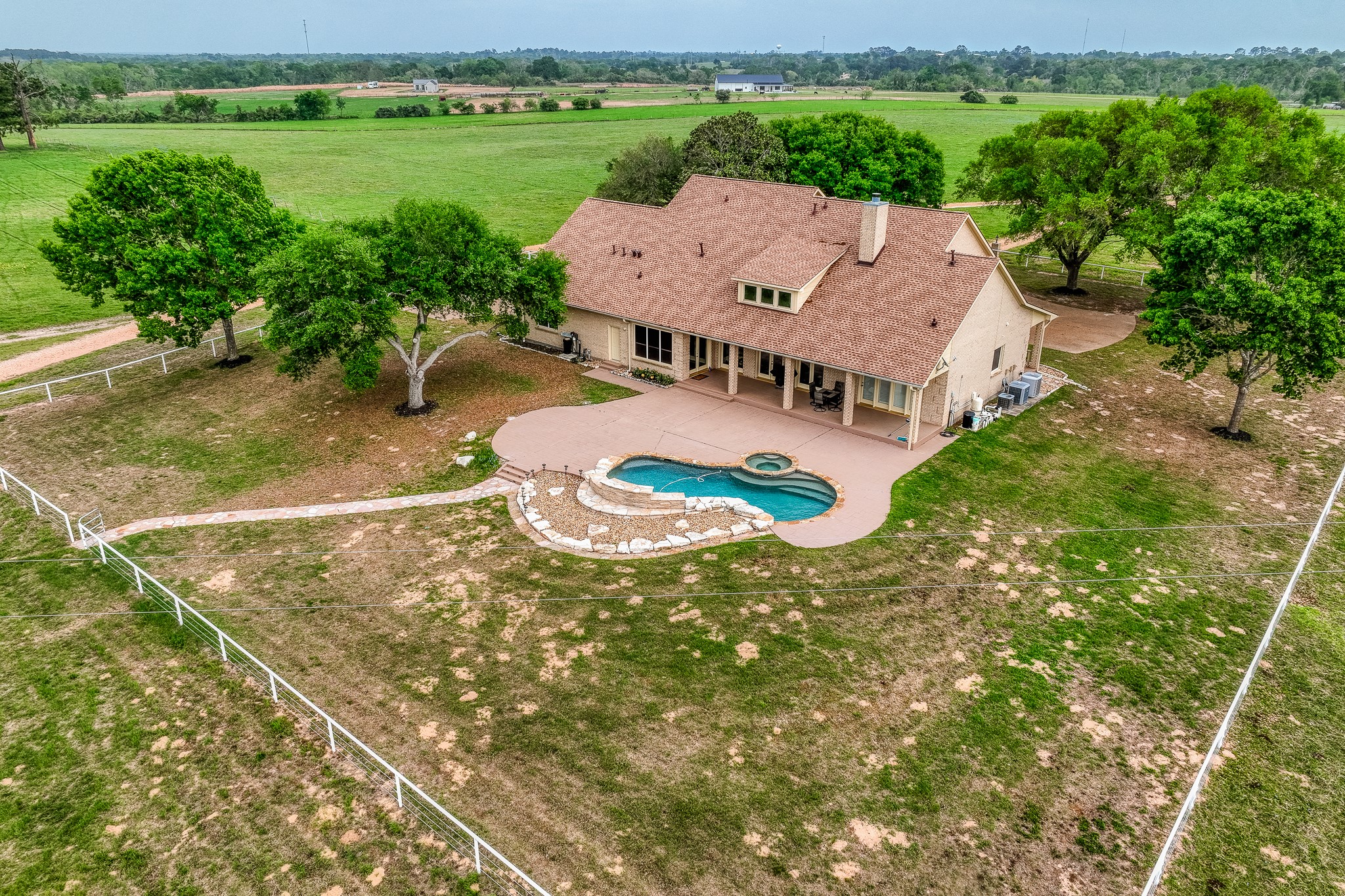 2204 Carter Road Bellville, TX 77418 - Photo 5 of 30 an aerial view of a house with garden space and street view