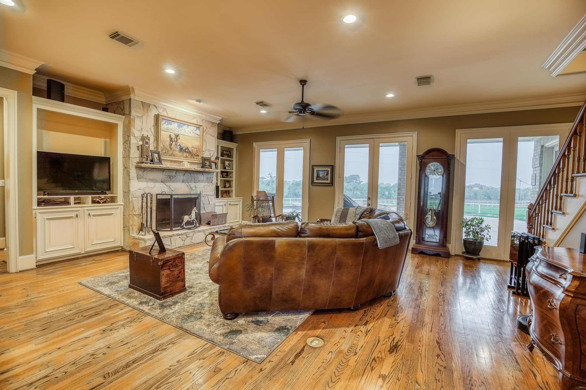 2204 Carter Road Bellville, TX 77418 - Photo 6 of 30 a living room with fireplace furniture and a flat screen tv