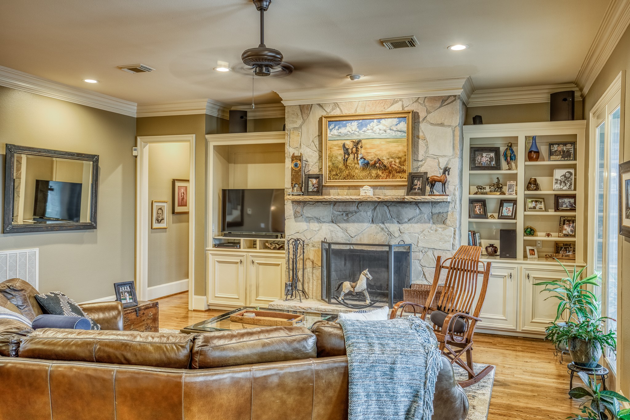 2204 Carter Road Bellville, TX 77418 - Photo 9 of 30 a living room with furniture or couch and a fireplace