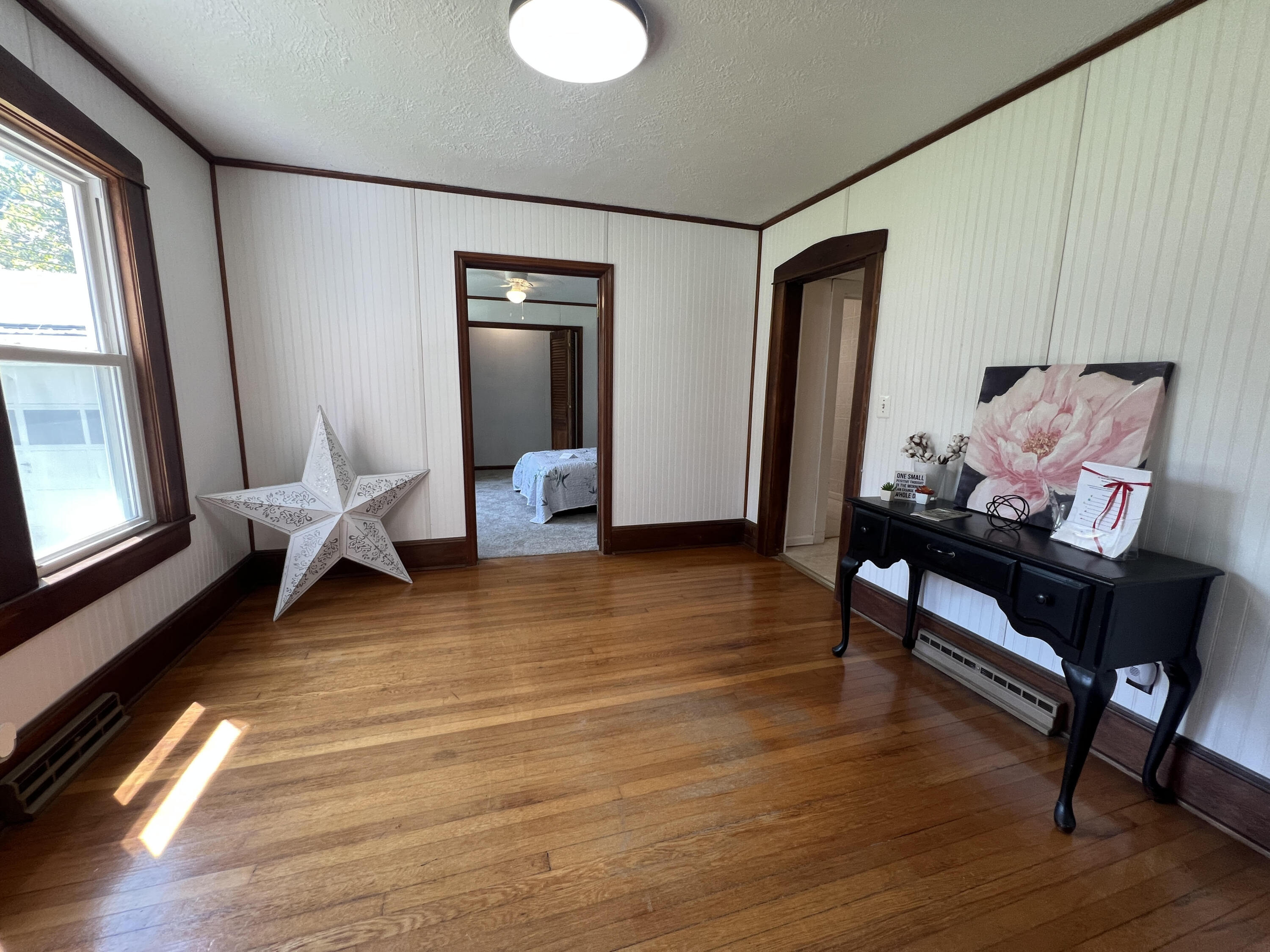 2827 Max Creek Road Hiwassee, VA 24347 - Photo 14 of 35 a living room with furniture and a wooden floor