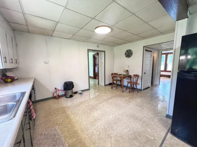 a room with furniture and gym equipment