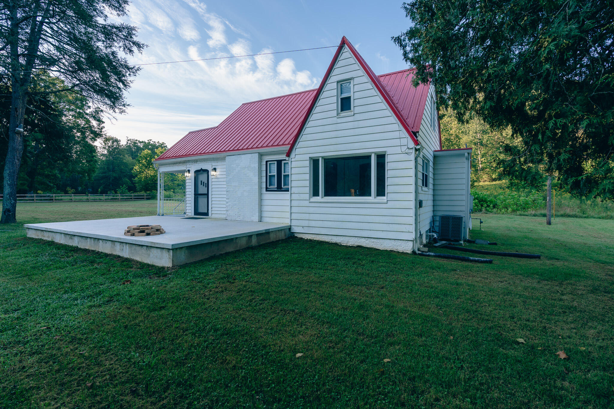 2827 Max Creek Road Hiwassee, VA 24347 - Photo 8 of 35 a front view of a house with a yard