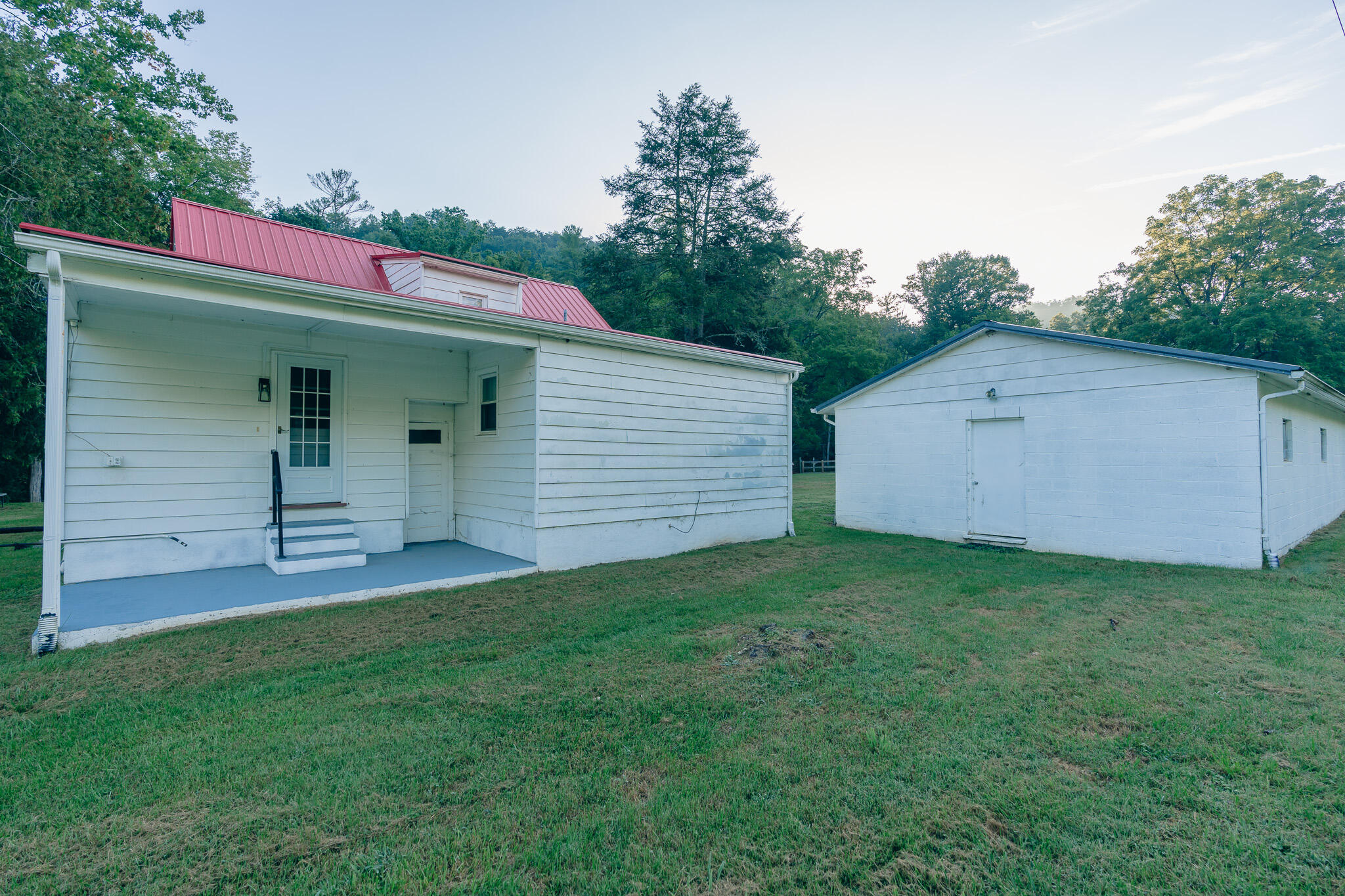2827 Max Creek Road Hiwassee, VA 24347 - Photo 9 of 35 a view of a backyard with a cabin