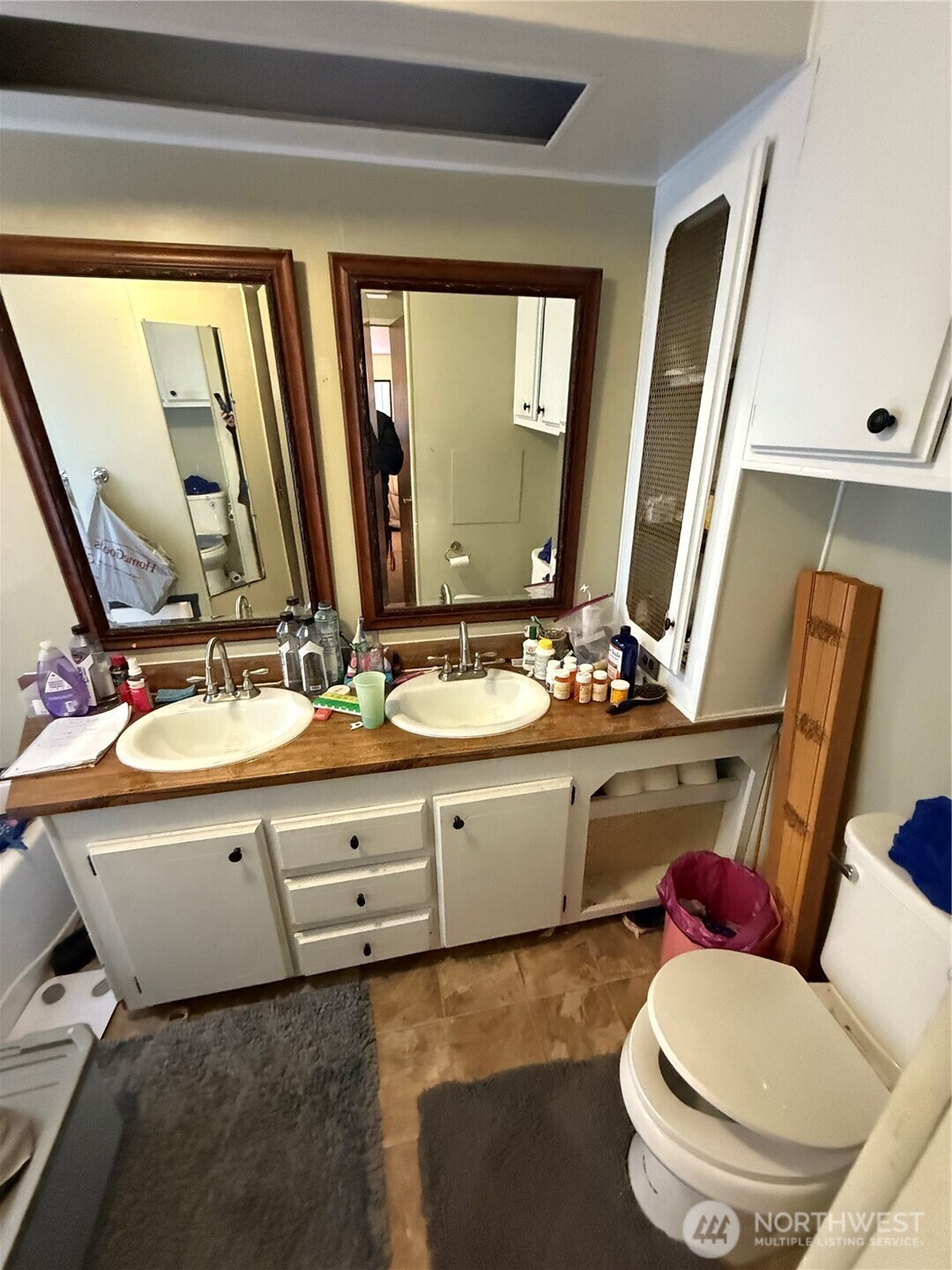 237 Collins Road Toledo, WA 98591 - Photo 19 of 25 a bathroom with a sink mirror vanity and toilet
