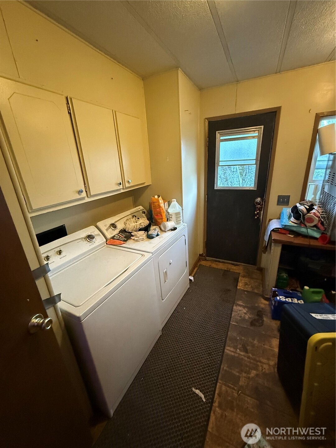 237 Collins Road Toledo, WA 98591 - Photo 20 of 25 a storage room with wooden floor and furniture