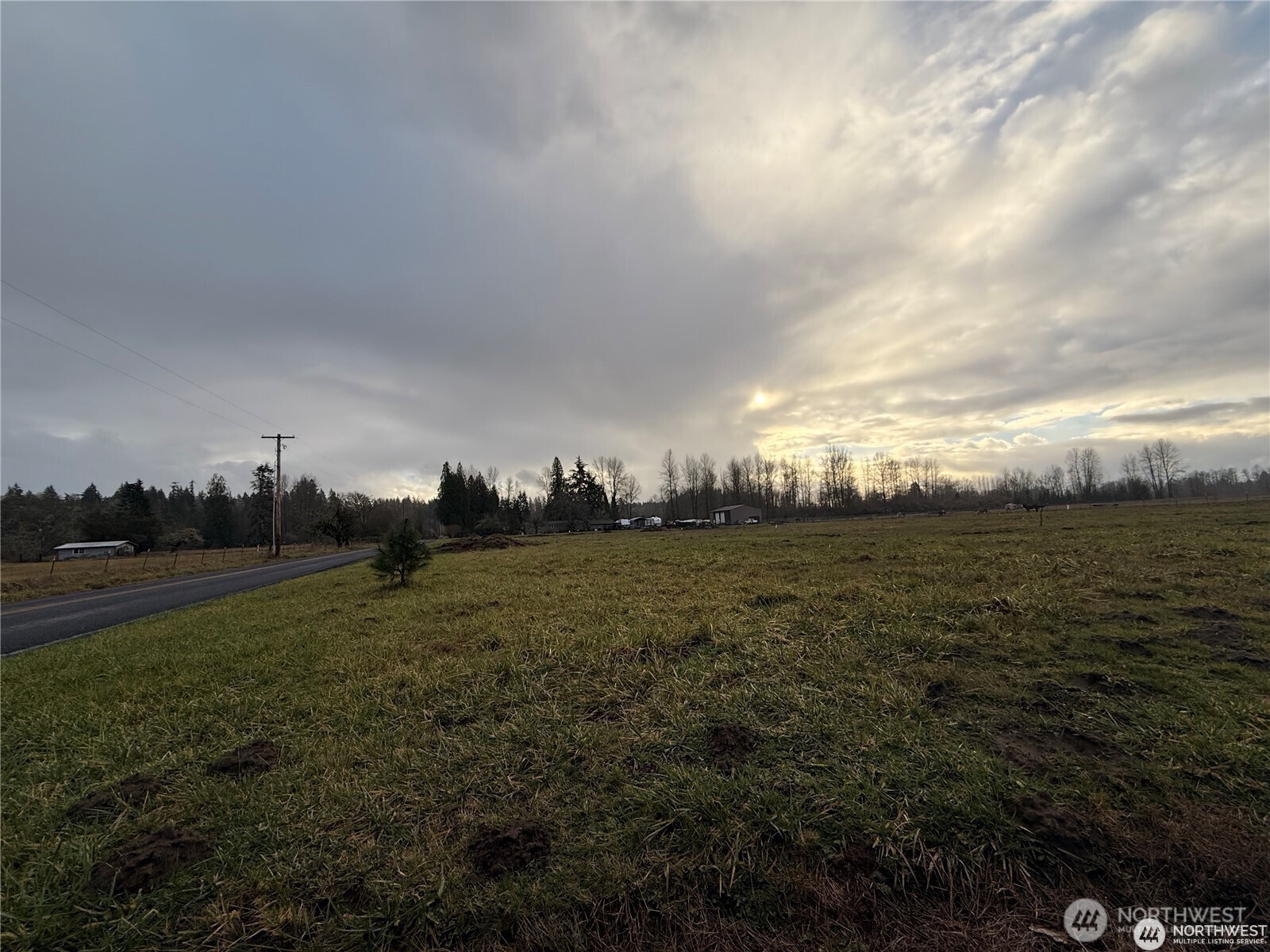 237 Collins Road Toledo, WA 98591 - Photo 8 of 25 a view of a field with an ocean