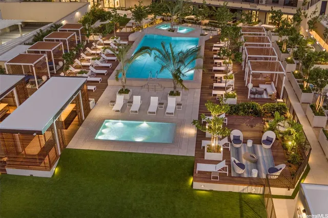 a view of a a dining room with furniture window and wooden floor