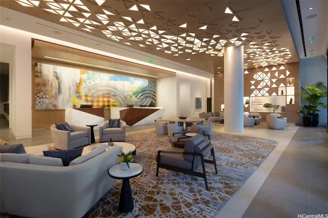 a kitchen with stainless steel appliances granite countertop a stove a sink a living room with furniture and large windows