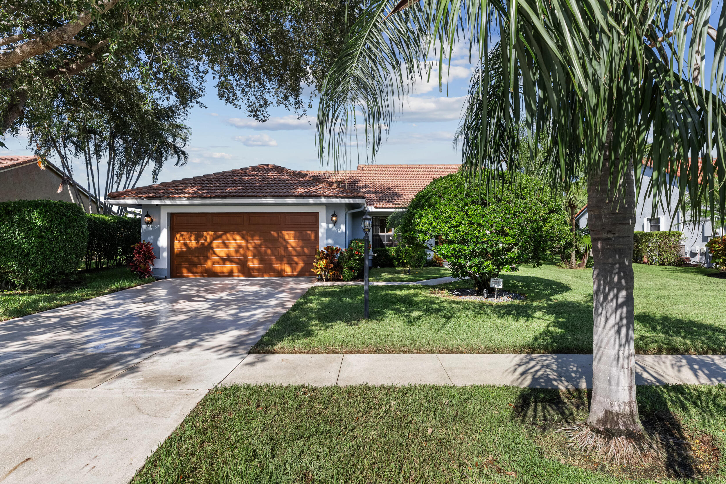 14451 Parker Ridge Court Delray Beach, FL 33484 - Photo 1 of 48 a view of outdoor space yard and porch