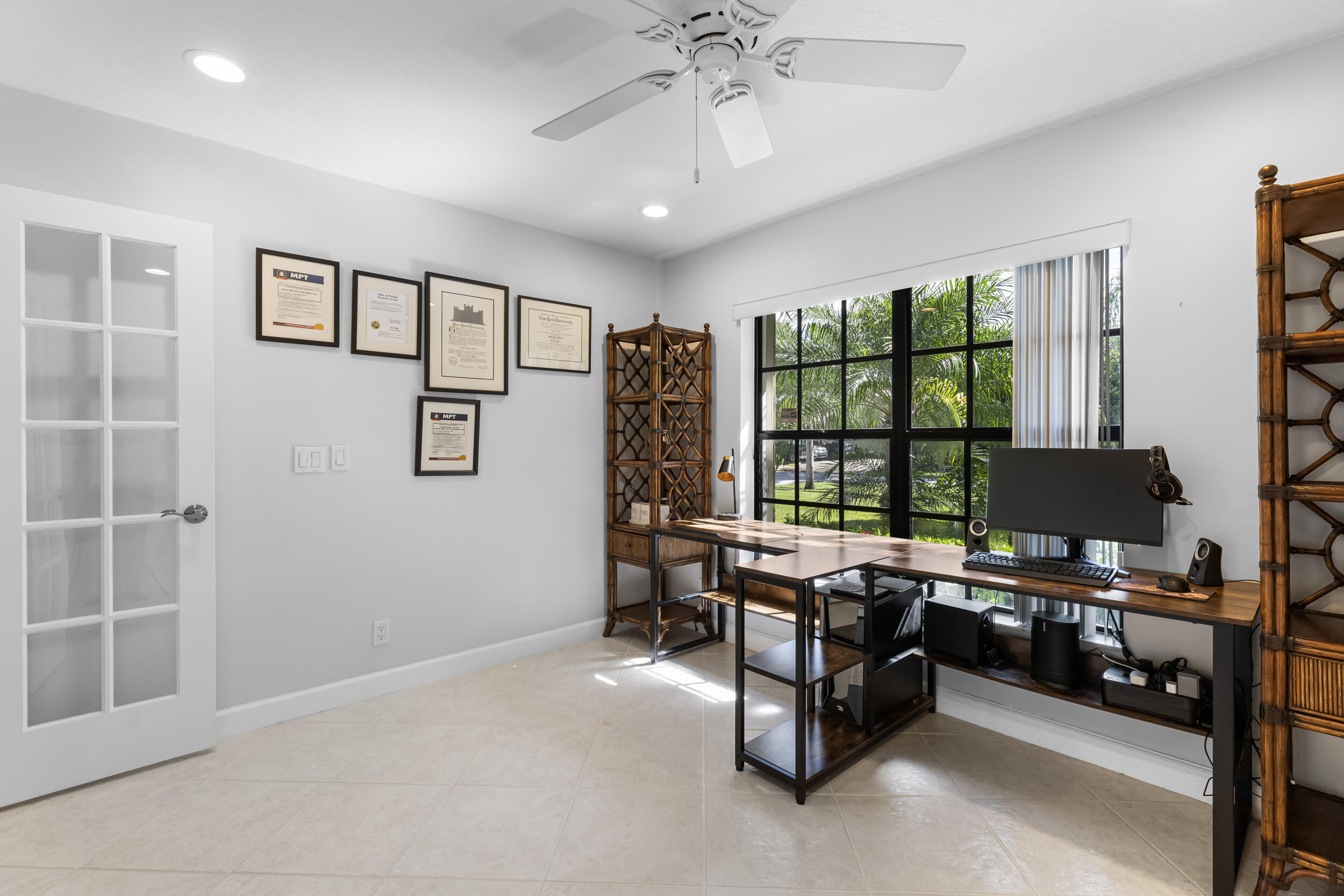 14451 Parker Ridge Court Delray Beach, FL 33484 - Photo 20 of 48 a view of a livingroom with workspace and a window