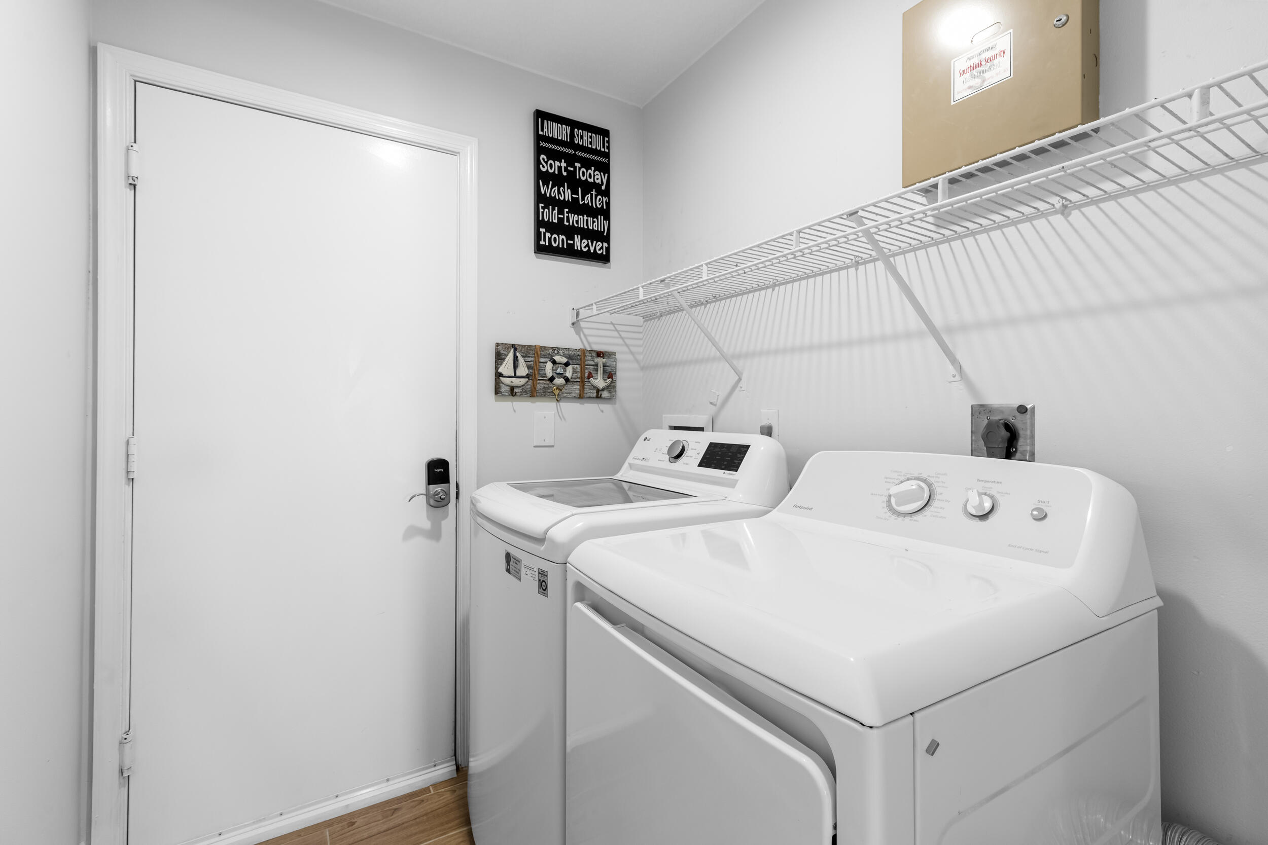 14451 Parker Ridge Court Delray Beach, FL 33484 - Photo 23 of 48 a utility room with dryer and washer