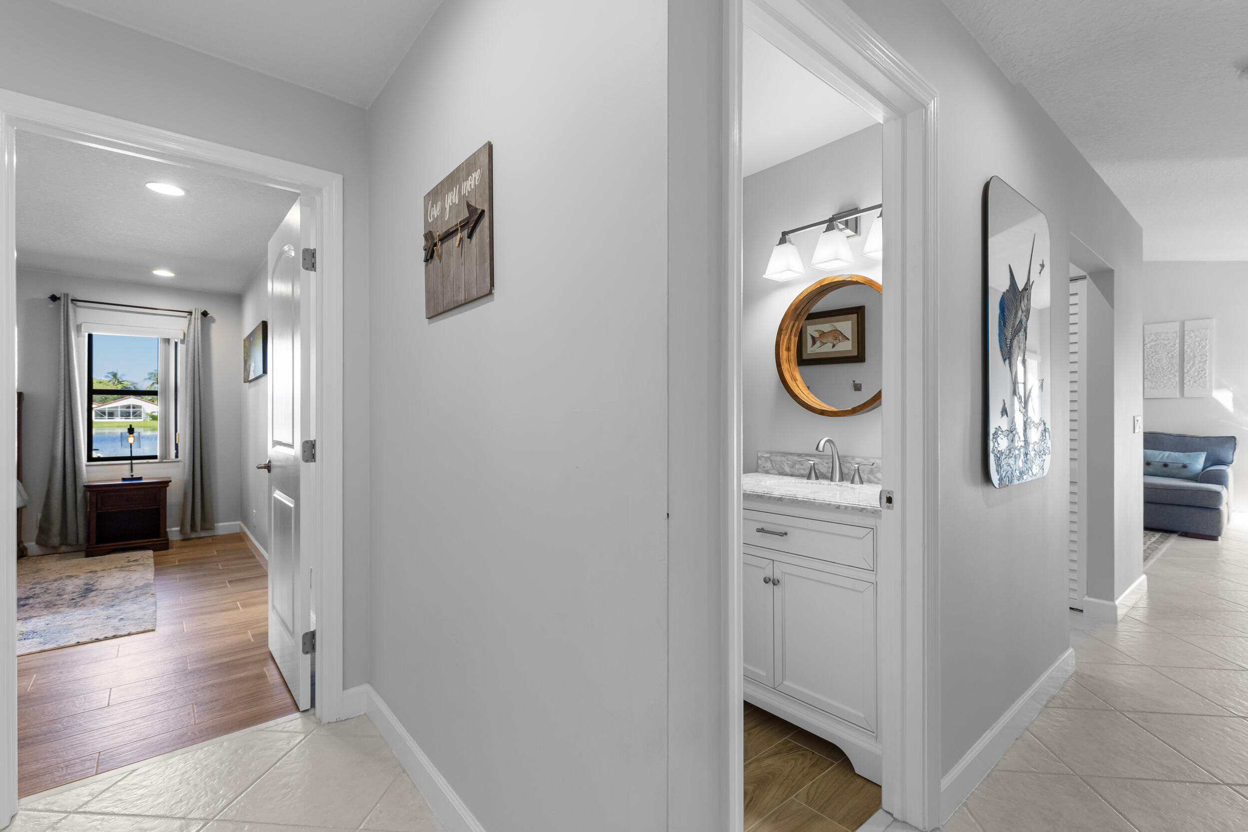 14451 Parker Ridge Court Delray Beach, FL 33484 - Photo 29 of 48 a view of entryway with wooden floor